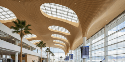 Modern architectural interior of Las Vegas airport with dramatic curved ceiling and natural light